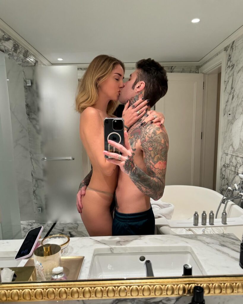 Photo shared by FEDEZ on December 10, 2023 tagging @chiaraferragni. May be a selfie of 1 person, blonde hair, people kissing, underwear, shower and text.