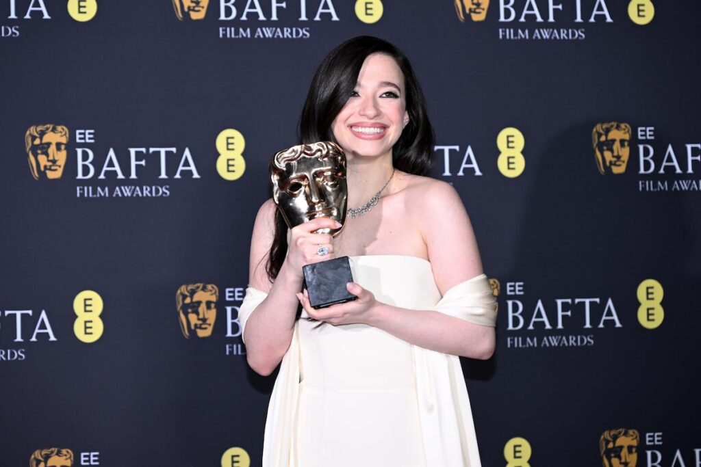 Mikey Madison poses with the Leading Actress Award for 'Anora' in the winners